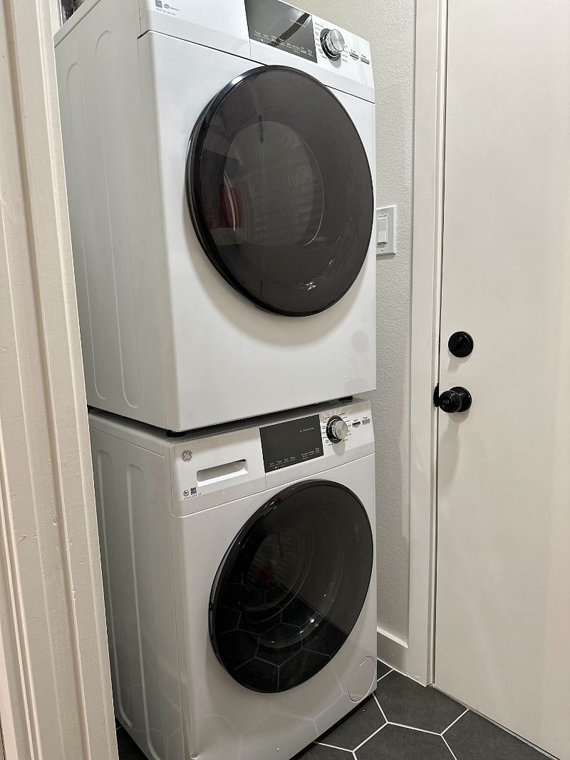 A compact, stackable washer and dryer are thoughtfully provided for added convenience throughout your stay.
