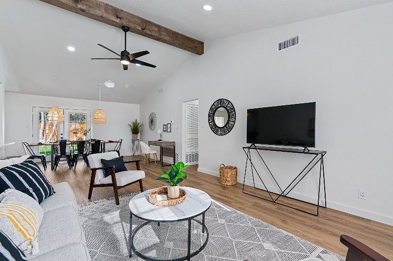 A light-filled living space with a 50-inch smart TVperfect for relaxing and unwinding.