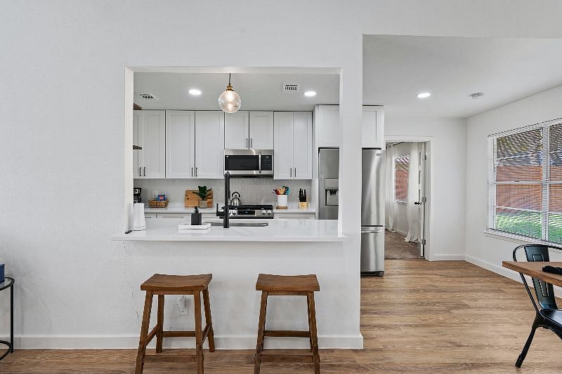 A versatile bar/island area perfect for casual dining or entertaining.