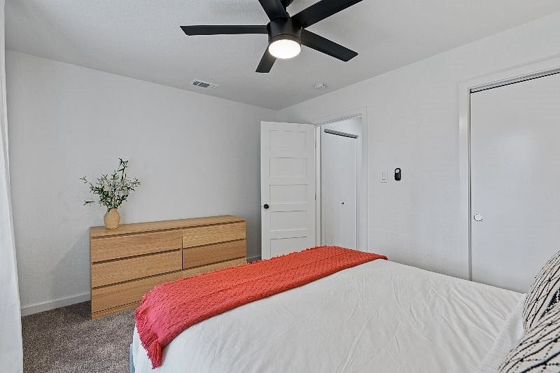 The third bedroom offers a six-drawer dresser and a closet, providing convenient storage for your stay.