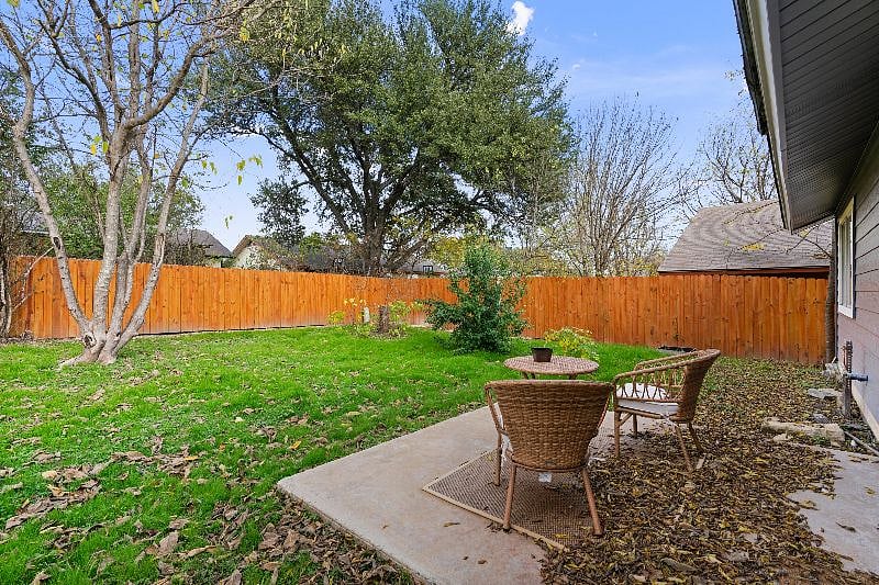 A cozy outdoor patio with a seating area, perfect for relaxing and unwinding.