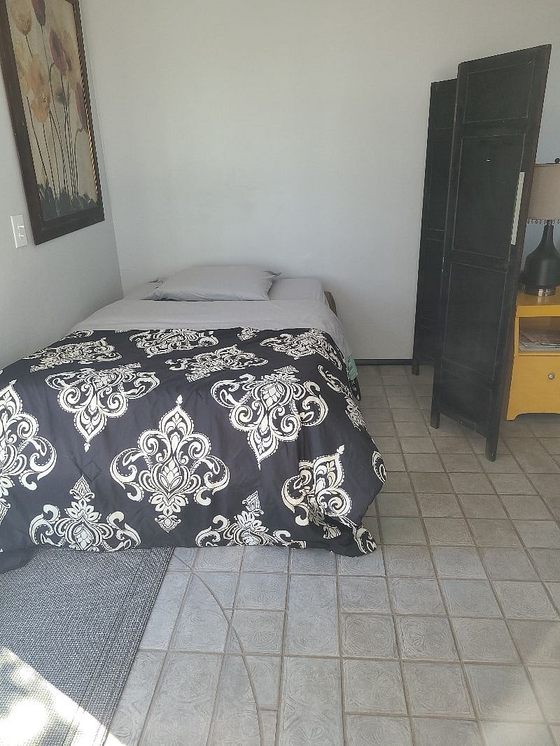 Roll-away bed. Collapses when not in use.