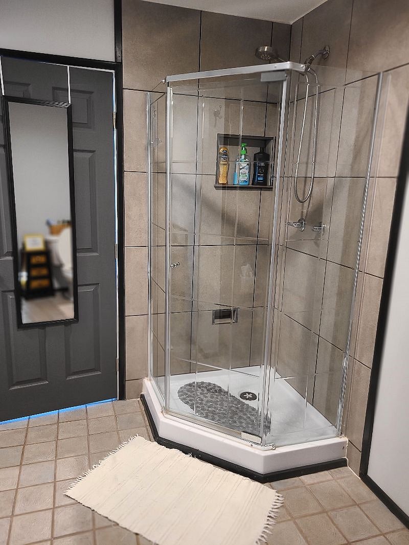 Bathroom shower with full body mirror