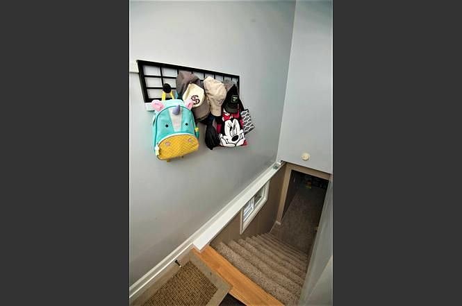 back door/back stairwell. leads to laundry room, workroom and slop sink.