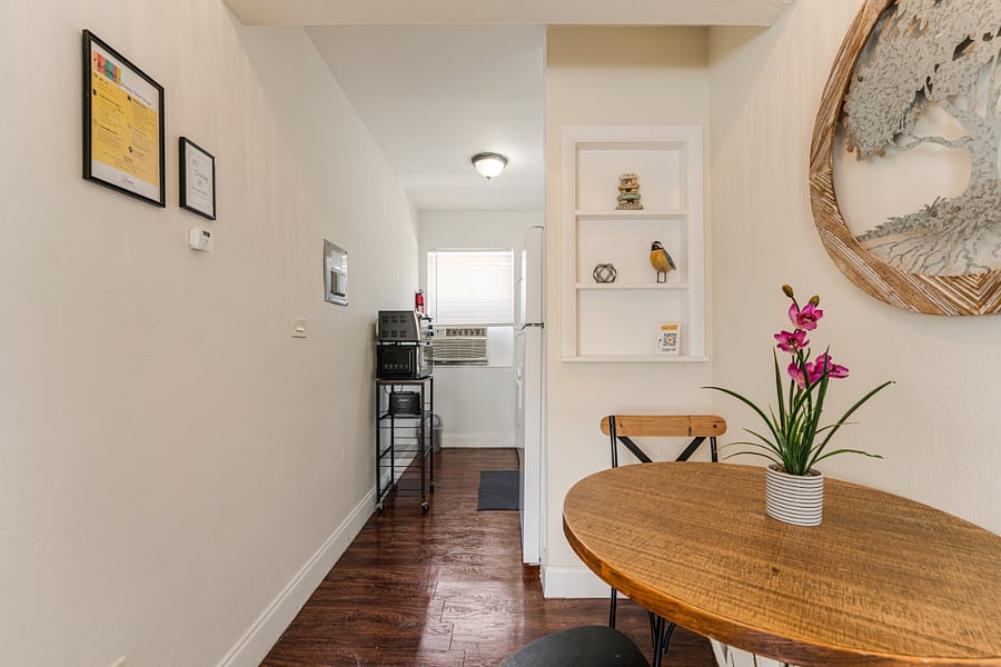 A charming dining nook with plenty of natural ligh, perfect for morning coffee or a cozy dinner at home.