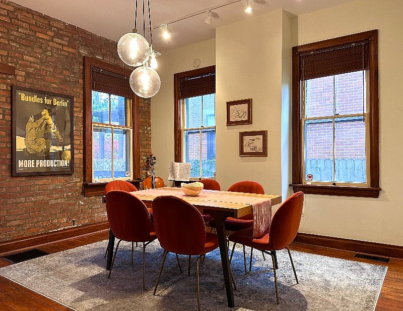 The dining room comfortably seats six. Its located in between the kitchen and living room.