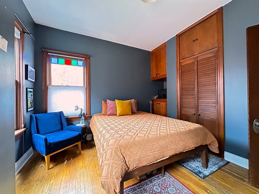The guest bedroom / home office has a queen size bed.