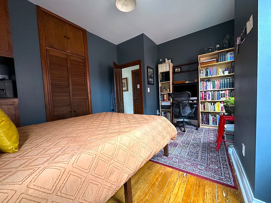 The guest bedroom / home office has a dedicated workspace.