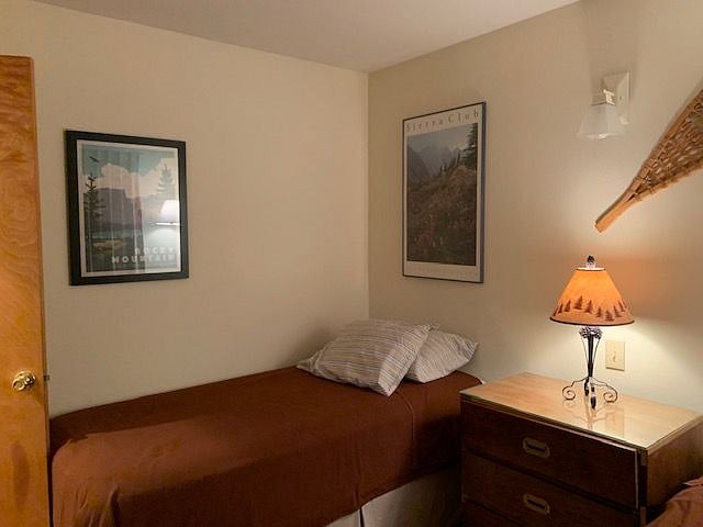 Second bedroom has two twin beds with firm, only several years old mattresses. Its full bathroom is immediately adjacent to this bedroom's entry door.