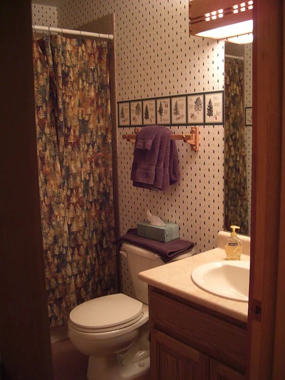 Full bath right next to second bedroom.