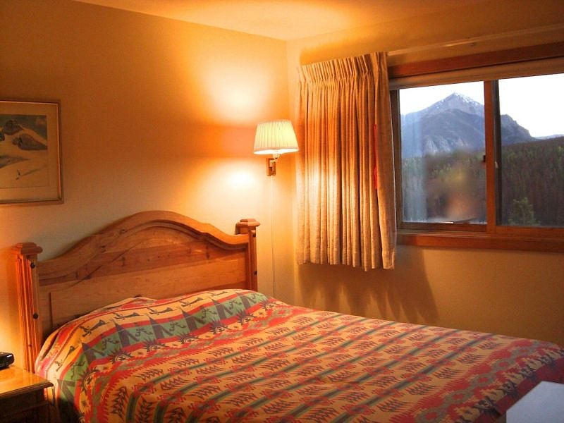 Master bedroom with queen-size firm mattressed bed. Double closet with sliding doors.