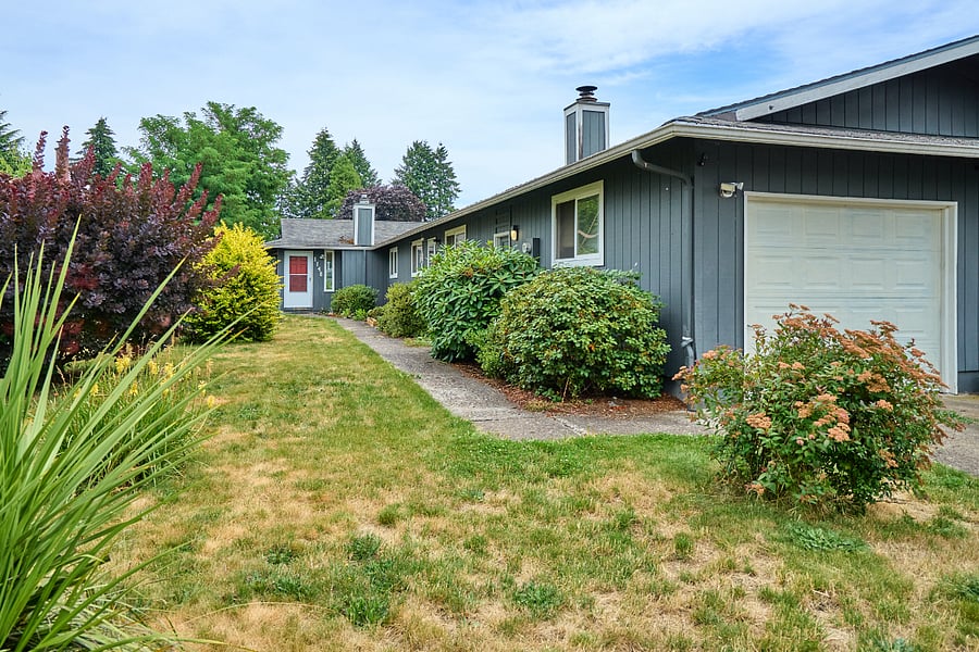 Front lawn and single car garage