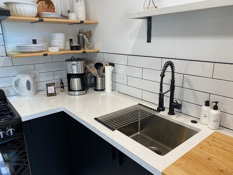 Brand new kitchen sink with plenty of counter space.