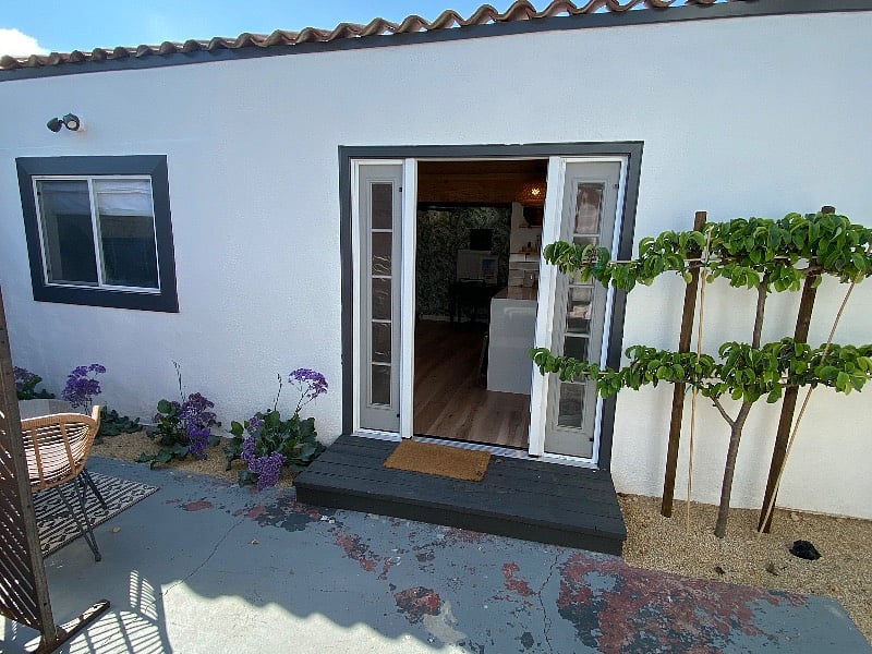 Front door with your own sitting space to the left. 