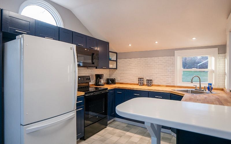 Nautical blue kitchen with service for 6 people! Spices, and pots and pans