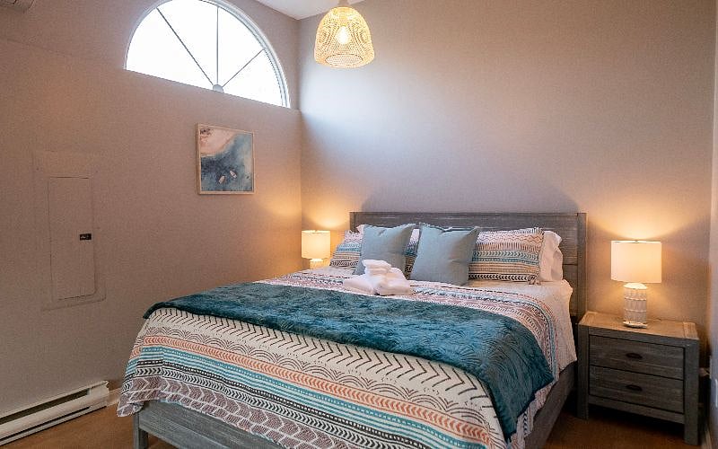 King sized bedroom with new mattress and furnishings! Closet and dresser