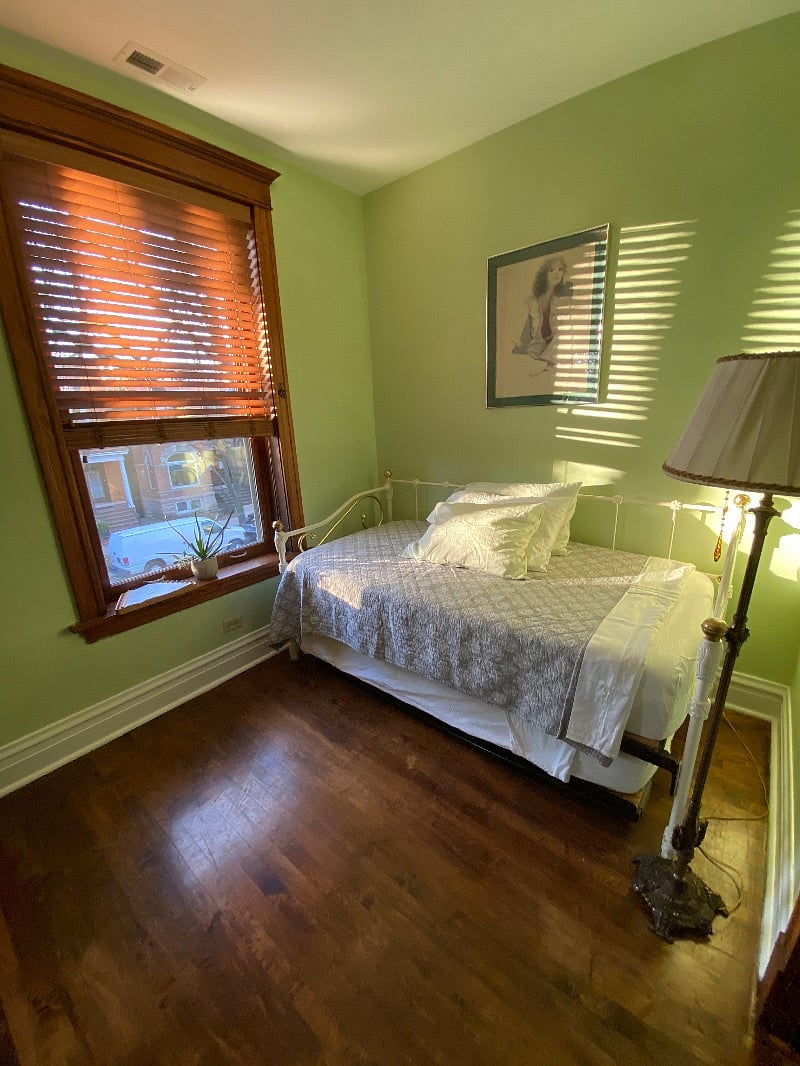 Sunny green bedroom. Good for an afternoon nap.  View.... up in the trees!