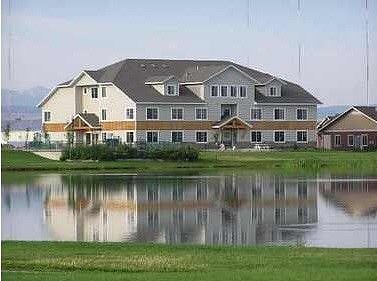 Our waterside building and pond.