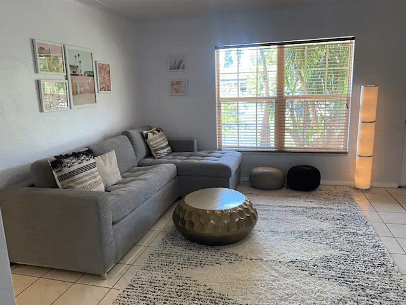 Pull-out sofa features a memory-foam mattress.