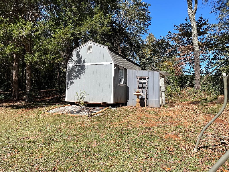 External shed, w A/C- can be used as game room, storage