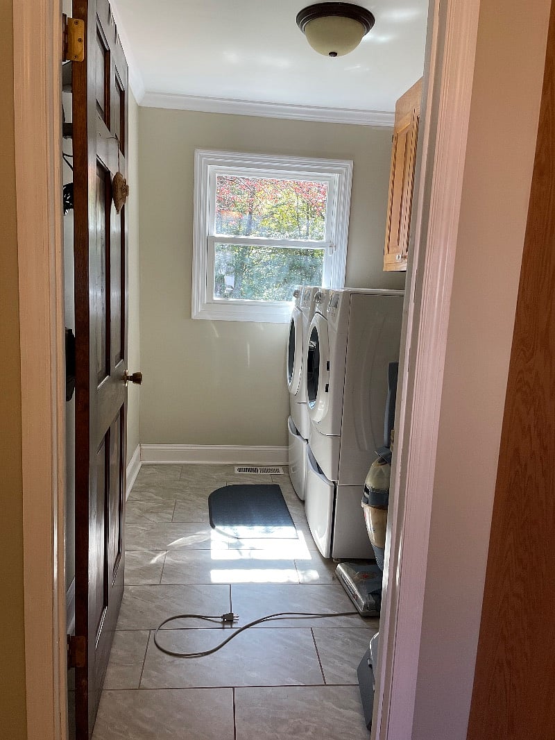 Laundry Room is supplied w Iron/Ironing Board, mop, small broom w dustpan