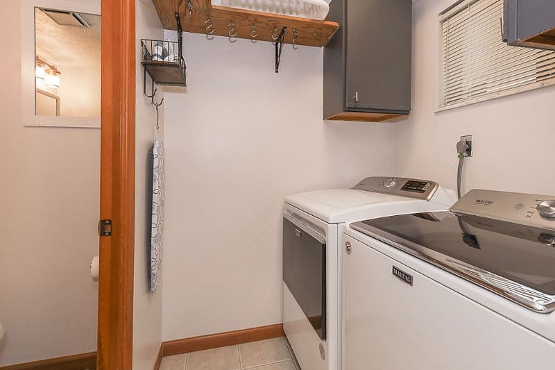 First floor laundry room next to kitchen