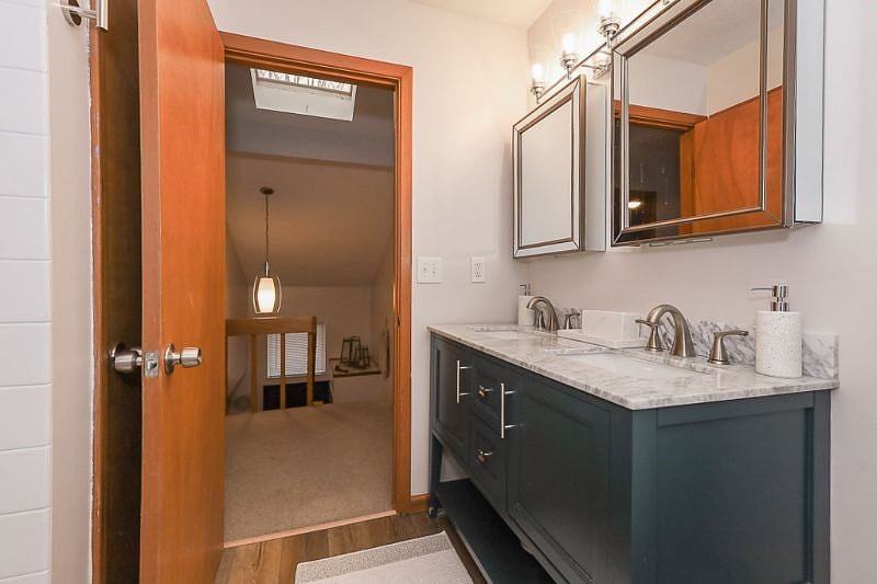 Second floor bathroom view to hallway