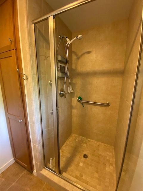 Shower w/linen closet to left