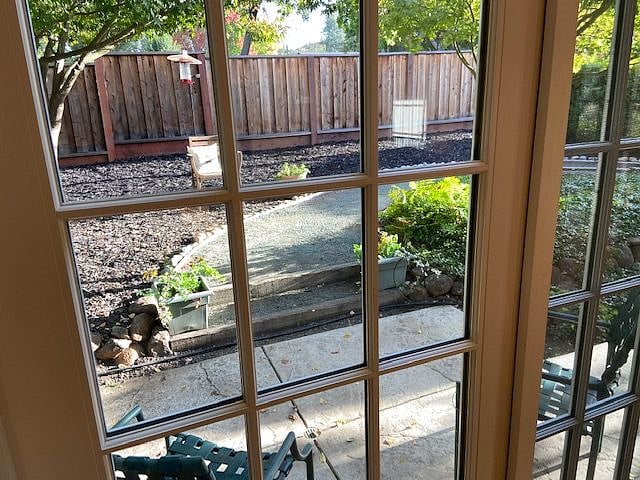 View directly out back through sliders of personal outdoor area
(lots of birds come to feeders)