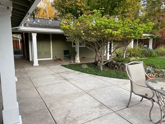 View of unit from homeowner's patio. Renter's entrance is in breezeway on left in photo