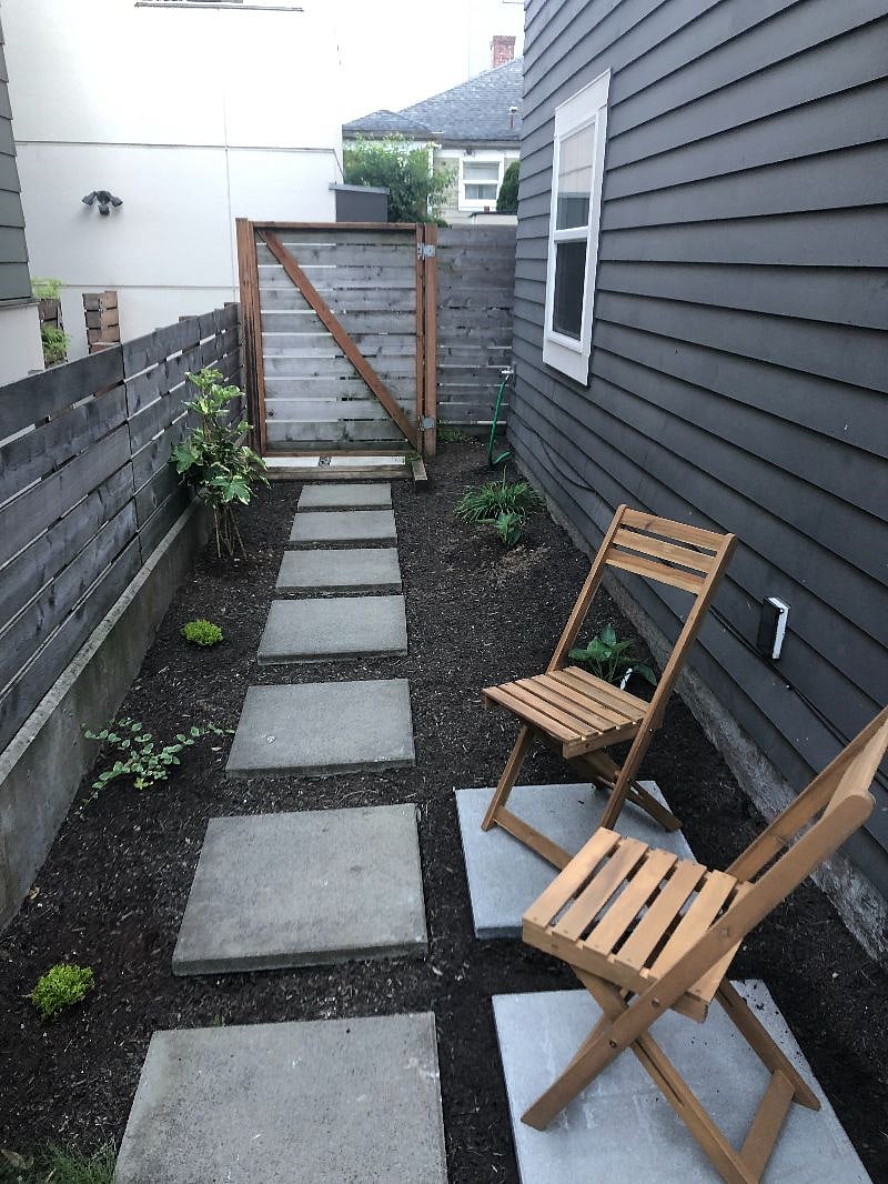 Small, private patio area in back of house