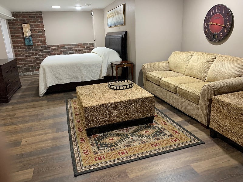 Lower level King bed and sitting area/TV