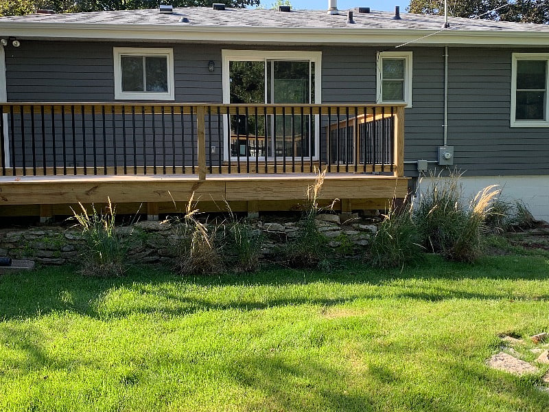 Large deck with steps to backyard