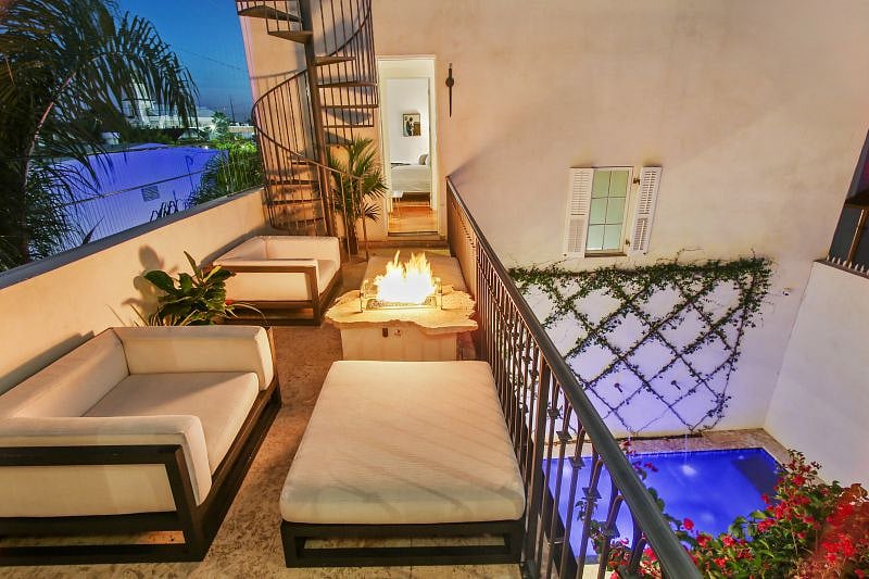 2nd Floor Bridge with view of Courtyard and Pool