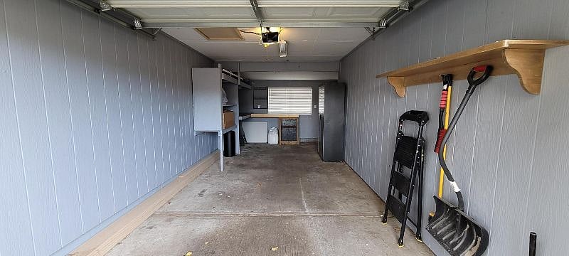 Small one car garage with opener. Direct access to the back yard and laundry room.
