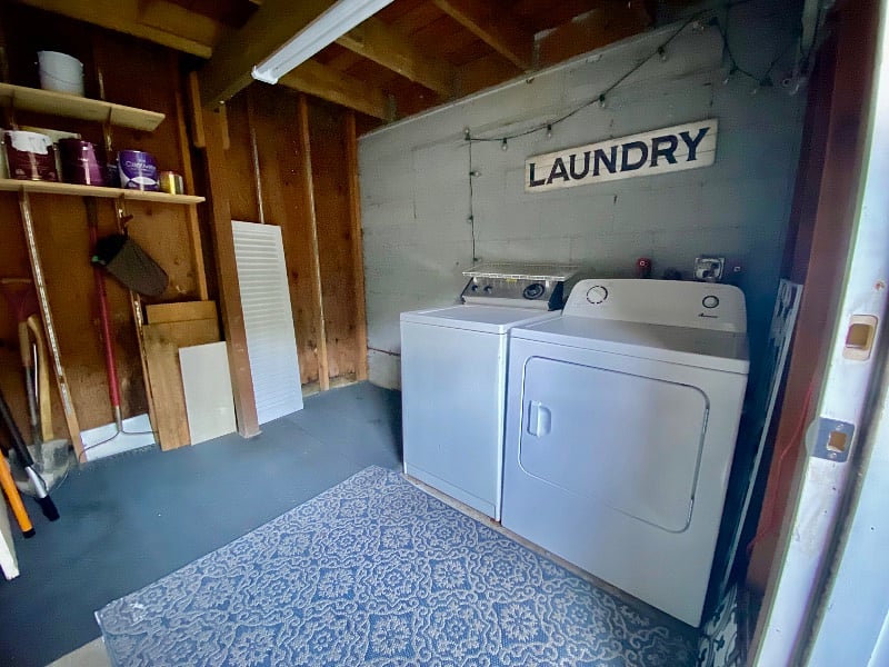 Shared laundry room - outside the house in patio area in an attached shed dwelling.