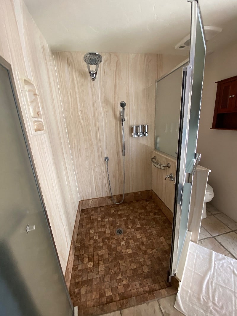 Disabled/wheelchair accessible shower in master bedroom.