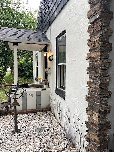 Styled after the locally famous Moffit houses https://www.thomasarchitect.com/moffitt-homes-in-iowa-city. This is truly a one of kind dwelling, and was part of the trolly line that once serve Iowa City.