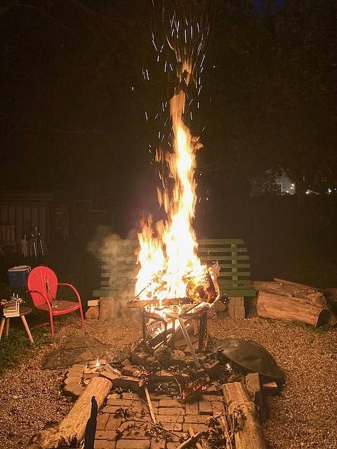 HUGE fire pit large with seating all around, truly and adult playground.