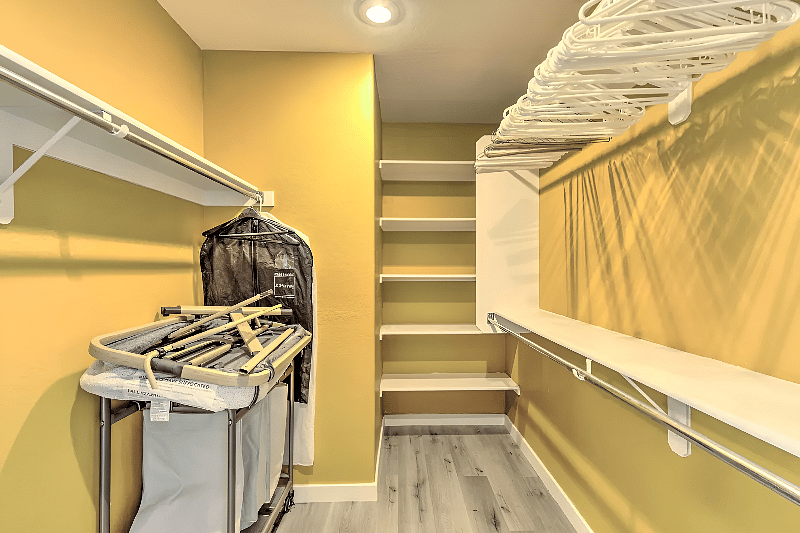 Master Walk-In Closet w/Clothes Hamper & Ironing Board