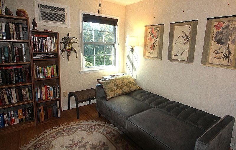 ... opens into a full-size bed. Next, the view through the window...
