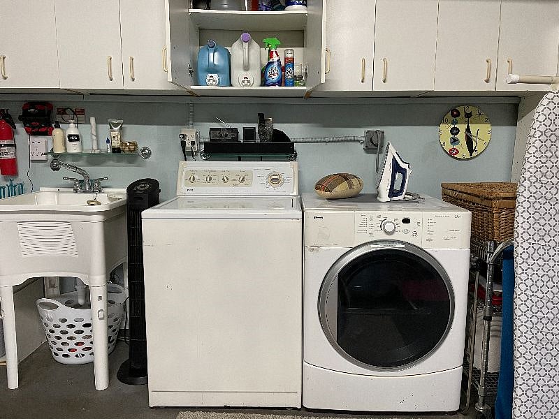 Downstairs Laundry and ironing station.  Complimentary supplies.