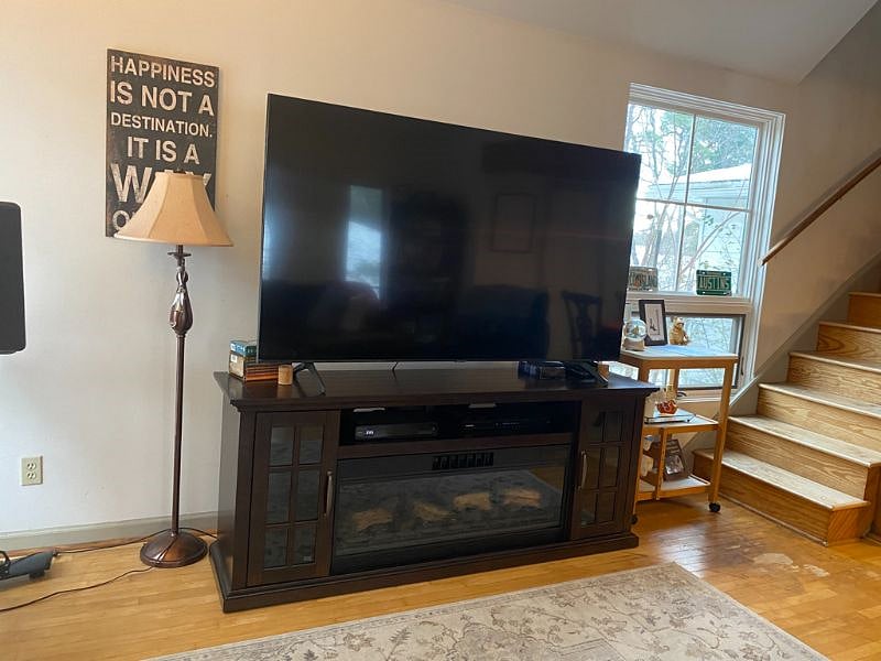 75" TV with Electric Fireplace