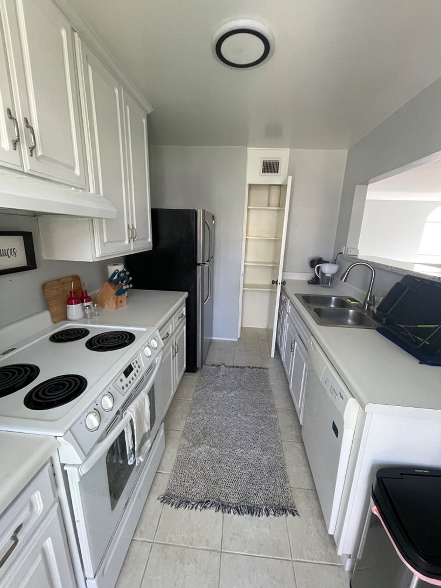 Kitchen with open pantry