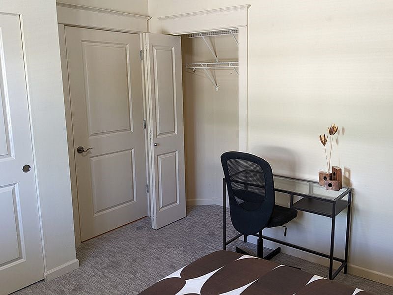 Work station and closet in bedroom