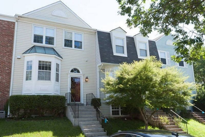 Front of home - two assigned parking spaces located directly in front of entrance