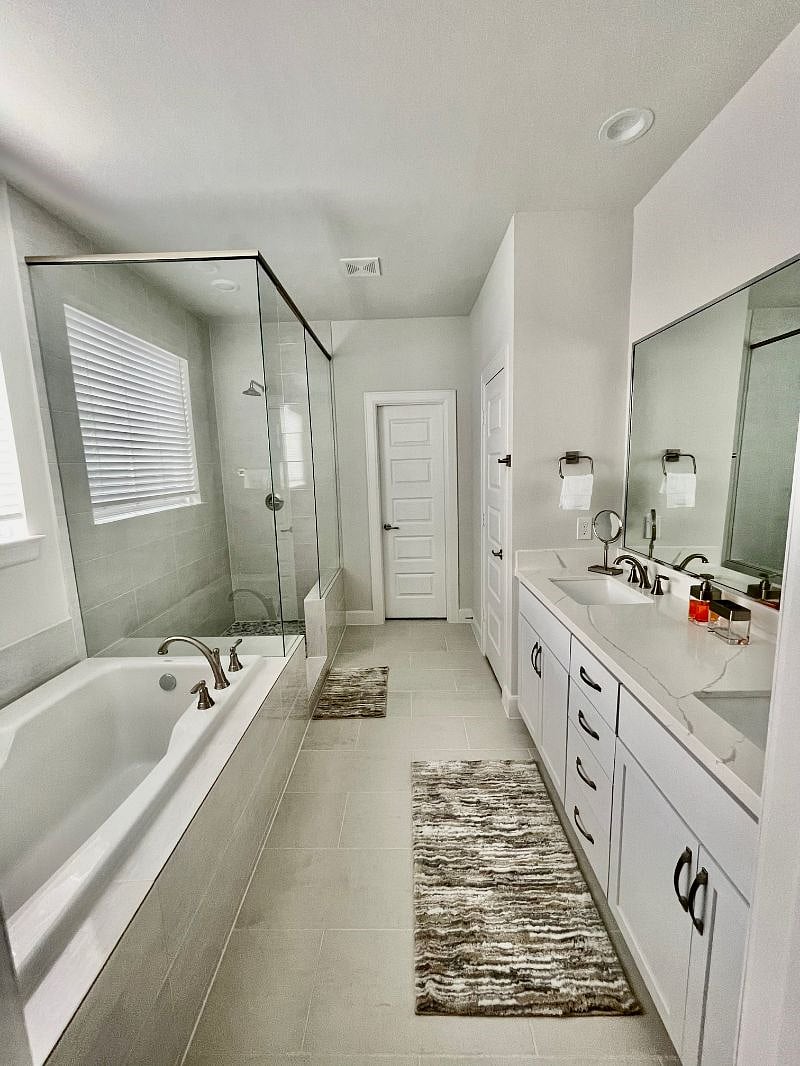 Third floor. Master bathroom with separate shower, tub and restroom- attached to master bedroom.
