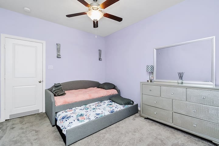 Upstairs Bedroom #1 W/ vanity and Trundle Bed W/ 2 Single Beds