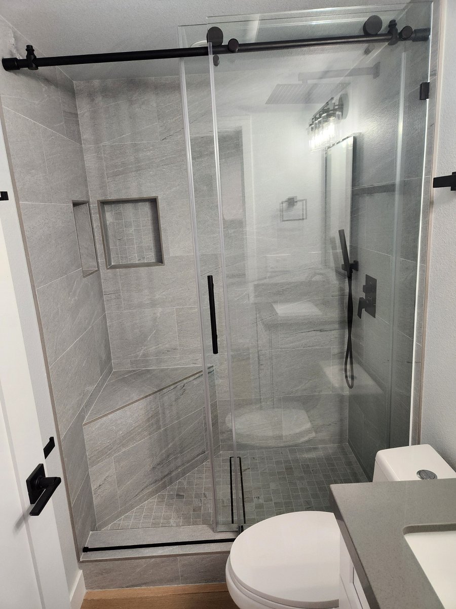 Two large niche spaces for personal shower items.