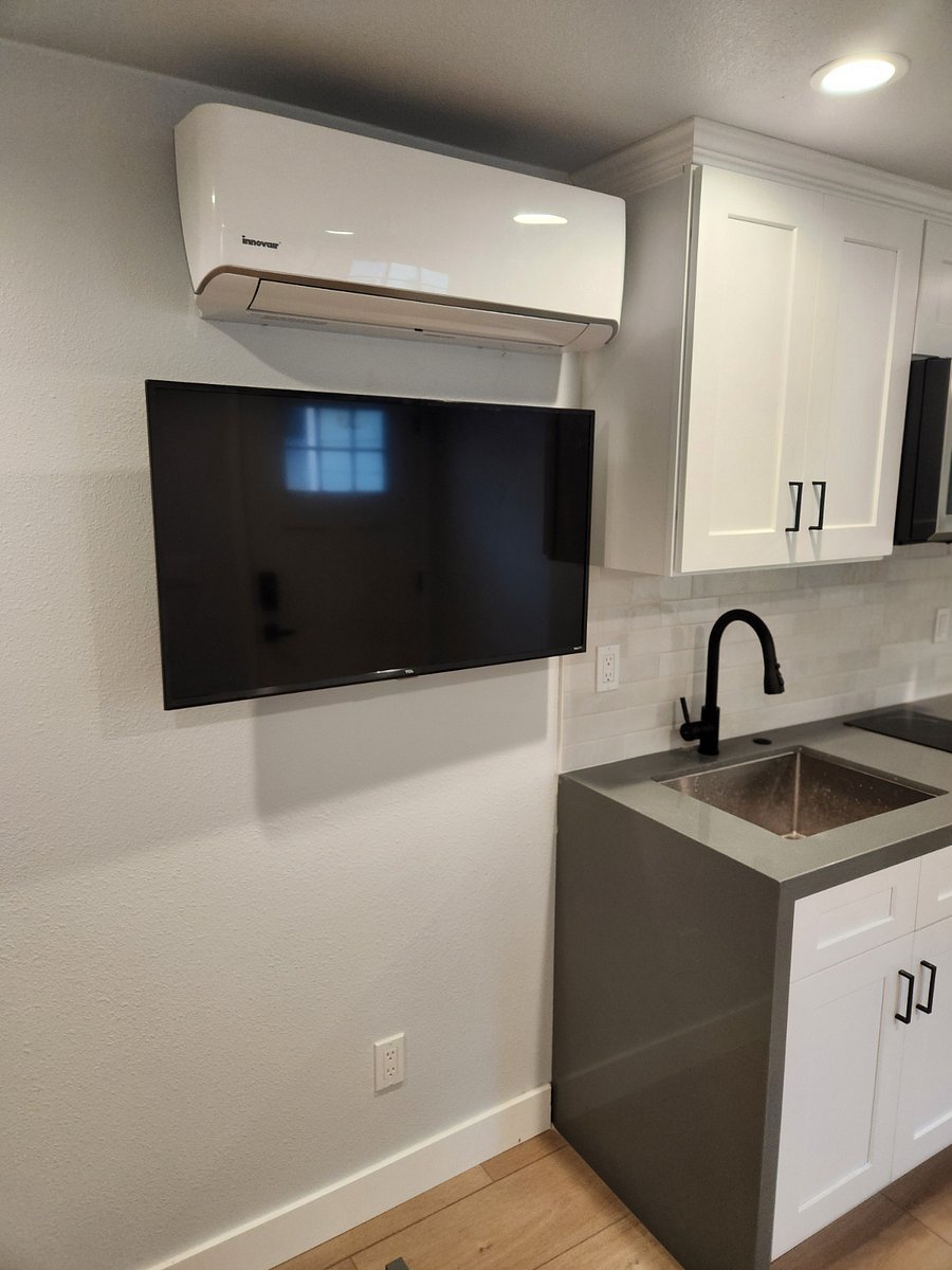 New TV that can pull from wall and rotate. Personal heat and air to control to your liking.